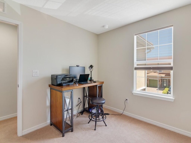 office featuring carpet floors and baseboards