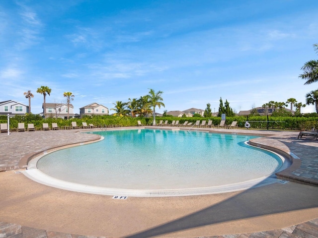 community pool with a patio