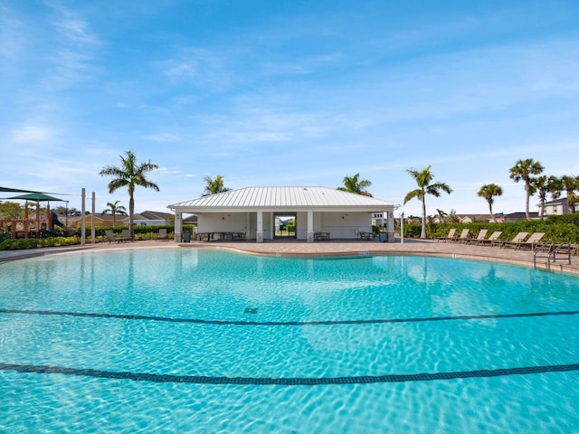 community pool with a patio