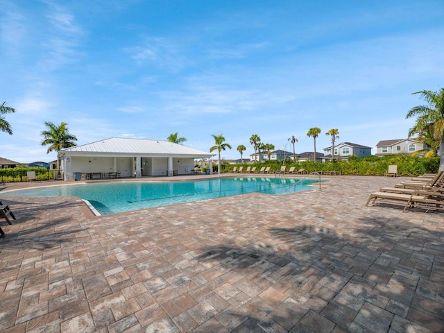 community pool with a patio