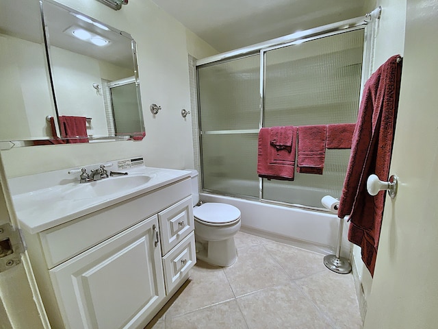 191 Durham D, Deerfield Beach, FL 33442 - full bathroom with toilet, combined bath / shower with glass door, vanity, and tile patterned flooring