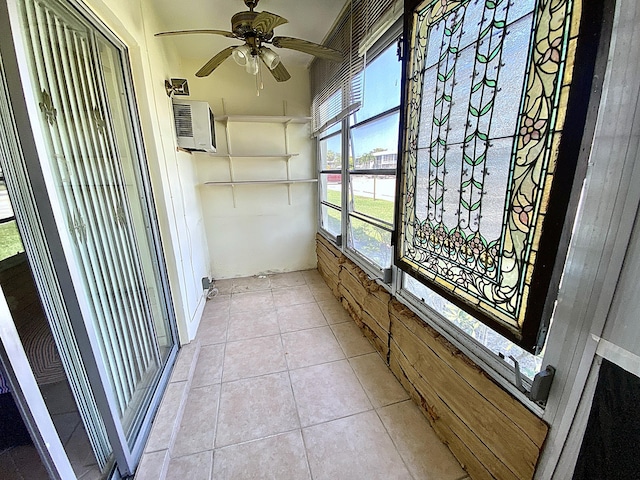 191 Durham D, Deerfield Beach, FL 33442 - unfurnished sunroom featuring a wall mounted AC