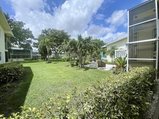 191 Durham D, Deerfield Beach, FL 33442 - view of yard featuring a patio