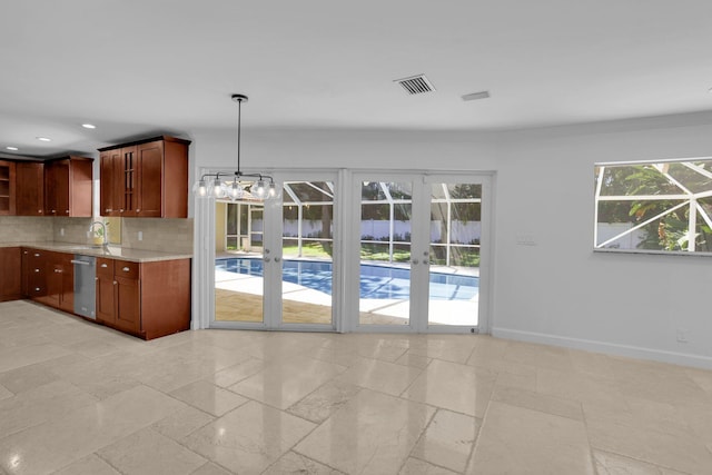 6769 Entrada Pl, Boca Raton, FL 33433 - kitchen featuring stainless steel dishwasher, french doors, decorative backsplash, light stone counters, and open shelves