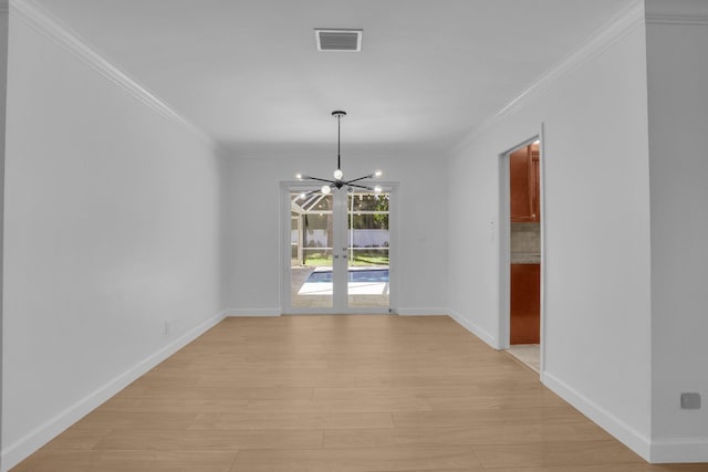 6769 Entrada Pl, Boca Raton, FL 33433 - unfurnished dining area with a chandelier, crown molding, and light wood finished floors