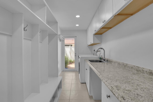 6769 Entrada Pl, Boca Raton, FL 33433 - laundry room featuring cabinet space, washer and clothes dryer, recessed lighting, and light tile patterned floors