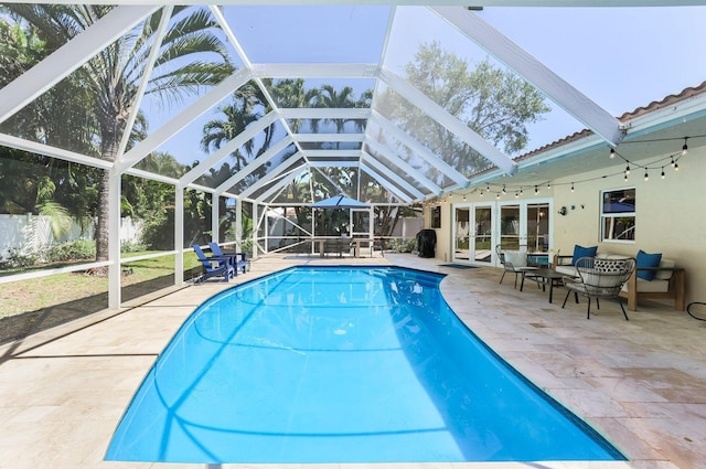 6769 Entrada Pl, Boca Raton, FL 33433 - view of swimming pool with a patio area, french doors, and a lanai