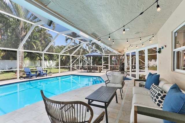 6769 Entrada Pl, Boca Raton, FL 33433 - view of pool with outdoor lounge area, a patio, a fenced backyard, and glass enclosure
