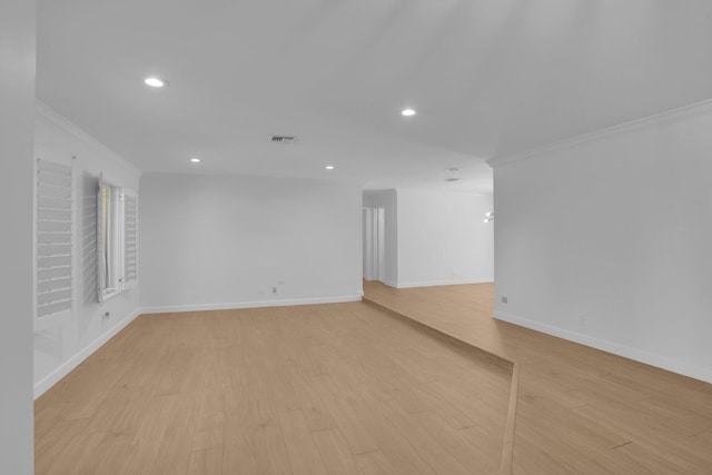 6769 Entrada Pl, Boca Raton, FL 33433 - empty room featuring crown molding, recessed lighting, and light wood-style floors