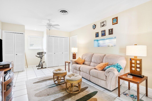 1440 SW 5th Ave, Boca Raton, FL 33432 - living room with light tile patterned flooring, ceiling fan, visible vents, and baseboards