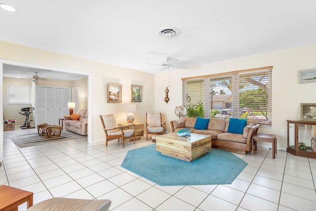 1440 SW 5th Ave, Boca Raton, FL 33432 - living room featuring a healthy amount of sunlight, a ceiling fan, and light tile patterned flooring