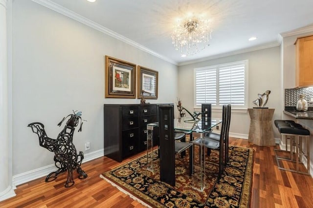 310 E Mallory Cir, Delray Beach, FL 33483 - dining room with wood finished floors, a notable chandelier, and baseboards
