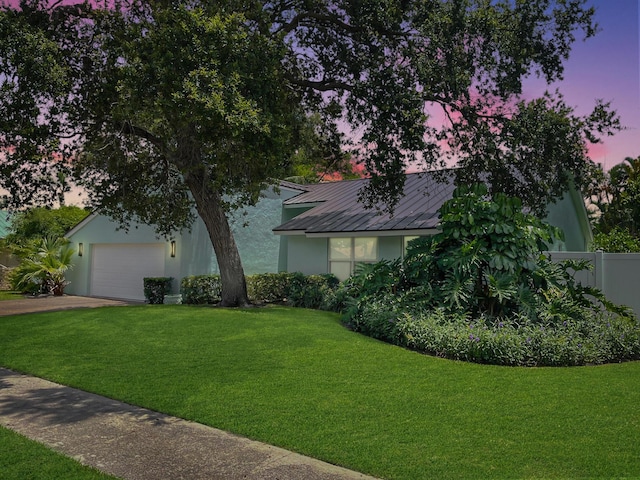 1380 SW 1st St, Boca Raton, FL 33486 - view of front facade with concrete driveway, stucco siding, and a metal roof