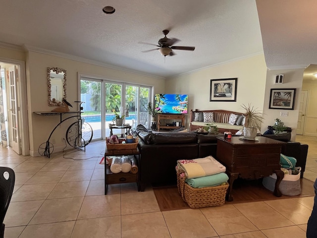 1380 SW 1st St, Boca Raton, FL 33486 - living area with lofted ceiling, ornamental molding, a ceiling fan, light tile patterned flooring, and a textured ceiling