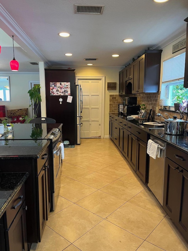 1380 SW 1st St, Boca Raton, FL 33486 - kitchen with stainless steel appliances, tasteful backsplash, recessed lighting, crown molding, and light tile patterned floors