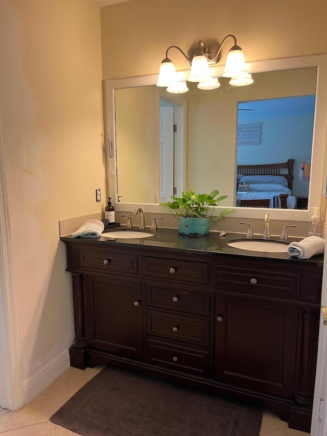 1380 SW 1st St, Boca Raton, FL 33486 - ensuite bathroom with double vanity, tile patterned flooring, and a chandelier