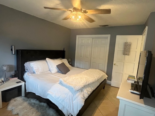 1380 SW 1st St, Boca Raton, FL 33486 - bedroom with a closet, a ceiling fan, and light tile patterned flooring