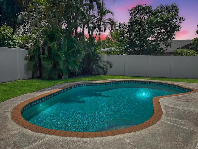 1380 SW 1st St, Boca Raton, FL 33486 - pool at dusk featuring a fenced backyard