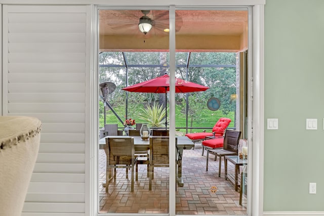 9068 Clearhill Rd, Boynton Beach, FL 33473 - dining room featuring brick floor and a ceiling fan