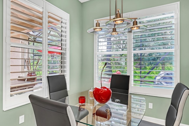 9068 Clearhill Rd, Boynton Beach, FL 33473 - dining room with a wealth of natural light and baseboards