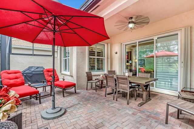 9068 Clearhill Rd, Boynton Beach, FL 33473 - view of patio with outdoor dining space and a ceiling fan