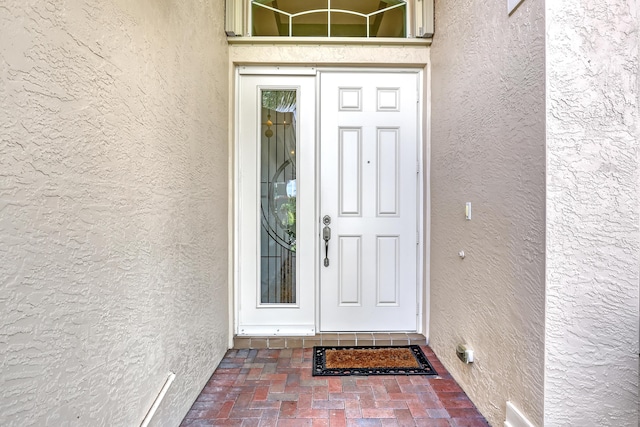 9068 Clearhill Rd, Boynton Beach, FL 33473 - property entrance with stucco siding