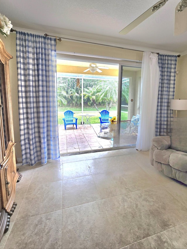 630 SW Treasure Cv, Port Saint Lucie, FL 34953 - unfurnished living room with ceiling fan and a sunroom