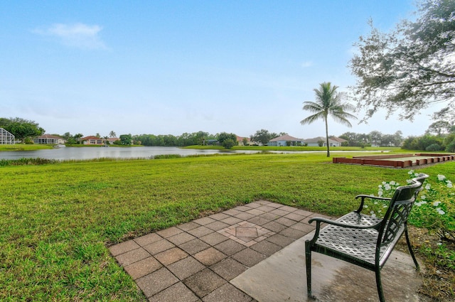 630 SW Treasure Cv, Port Saint Lucie, FL 34953 - view of patio / terrace featuring a water view