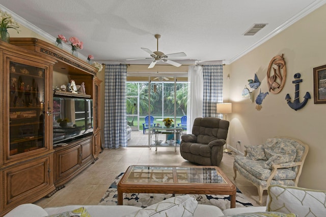 630 SW Treasure Cv, Port Saint Lucie, FL 34953 - living room with crown molding, light tile patterned floors, a ceiling fan, and visible vents
