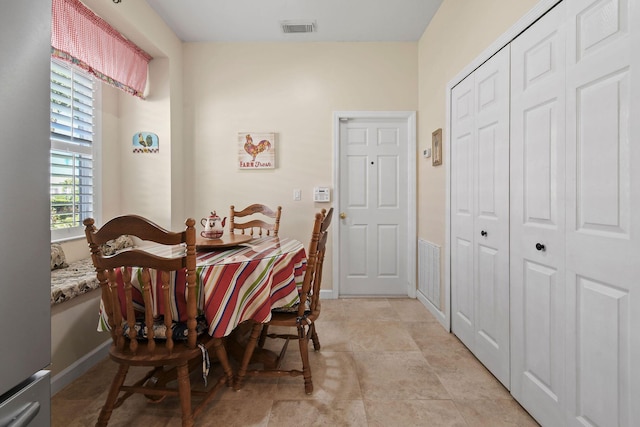630 SW Treasure Cv, Port Saint Lucie, FL 34953 - dining space featuring baseboards and visible vents