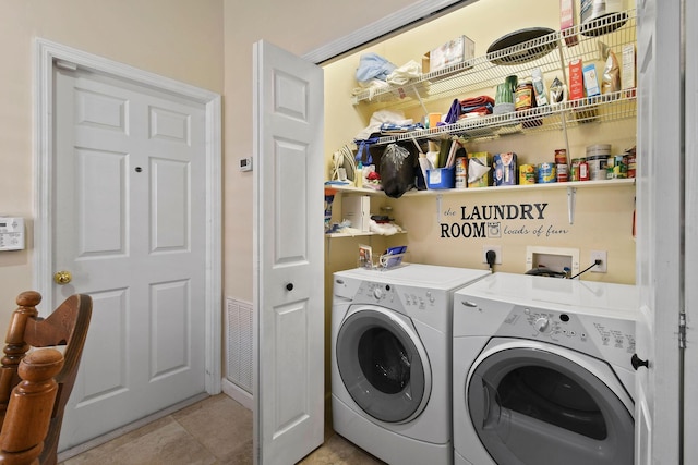 630 SW Treasure Cv, Port Saint Lucie, FL 34953 - clothes washing area featuring separate washer and dryer, laundry area, and visible vents