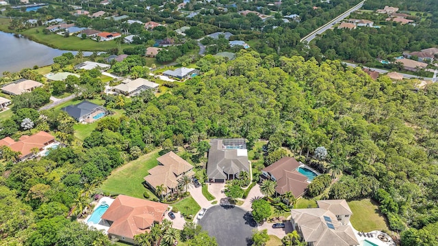 aerial view featuring a water view and a residential view