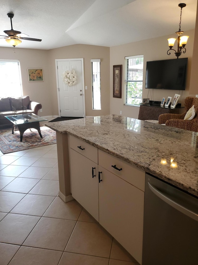 2831 Stoneway Ln Unit C, Fort Pierce, FL 34982 - kitchen featuring open floor plan, light tile patterned floors, and plenty of natural light