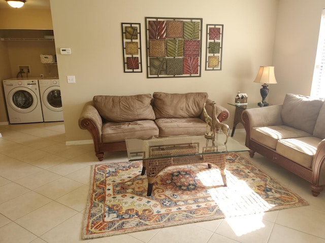 2831 Stoneway Ln Unit C, Fort Pierce, FL 34982 - tiled living room with washing machine and clothes dryer and baseboards