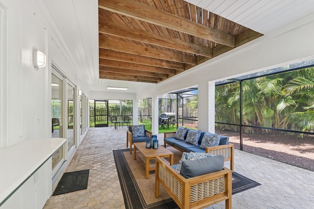 sunroom / solarium with an outdoor hangout area