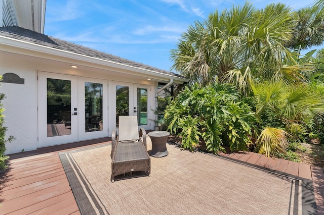 view of patio featuring a wooden deck and french doors