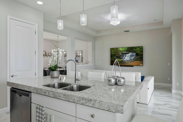 15649 Orchard Dr, Westlake, FL 33470 - kitchen featuring baseboards, a center island with sink, dishwasher, marble finish floor, and a sink