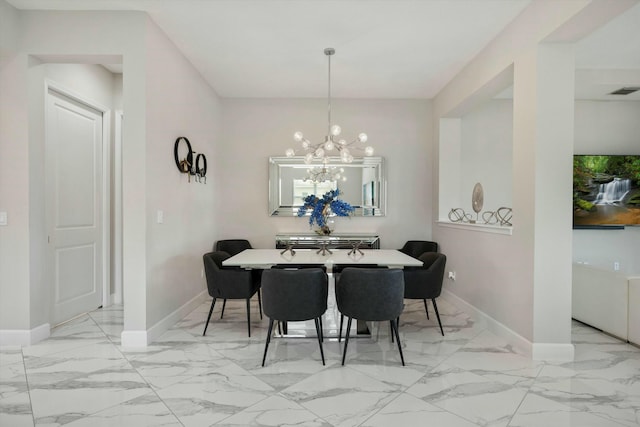 15649 Orchard Dr, Westlake, FL 33470 - dining room featuring a notable chandelier, marble finish floor, baseboards, and visible vents
