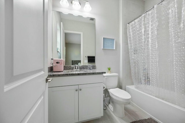 15649 Orchard Dr, Westlake, FL 33470 - bathroom featuring visible vents, toilet, shower / bath combo with shower curtain, and vanity
