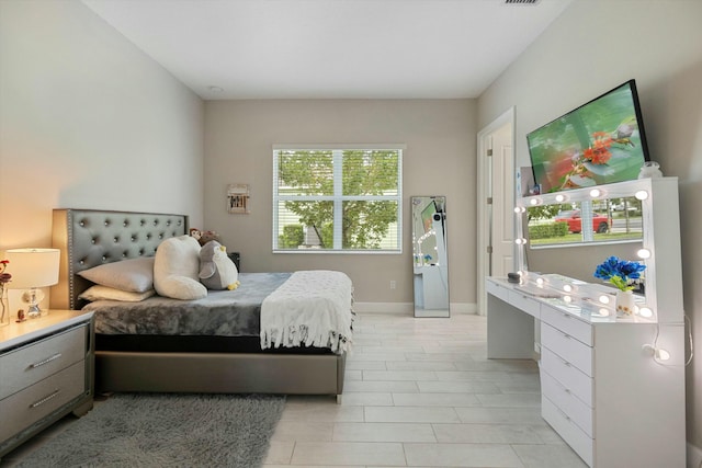 15649 Orchard Dr, Westlake, FL 33470 - bedroom featuring light tile patterned floors and baseboards