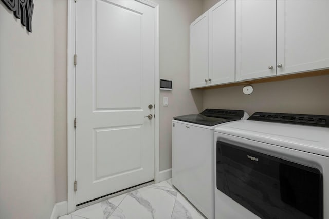 15649 Orchard Dr, Westlake, FL 33470 - washroom featuring marble finish floor, independent washer and dryer, baseboards, and cabinet space