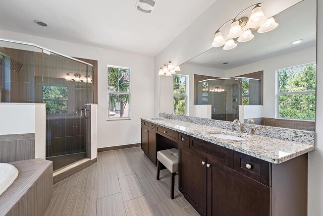 122 Diamante Way, Jupiter, FL 33477 - bathroom with a chandelier, plenty of natural light, and a shower stall