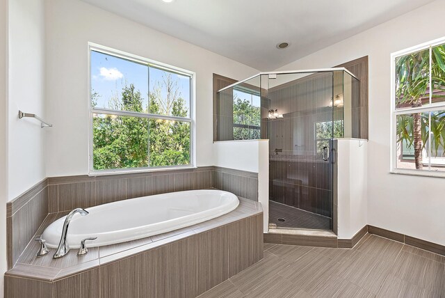 122 Diamante Way, Jupiter, FL 33477 - bathroom with a shower stall, a garden tub, and tile patterned flooring