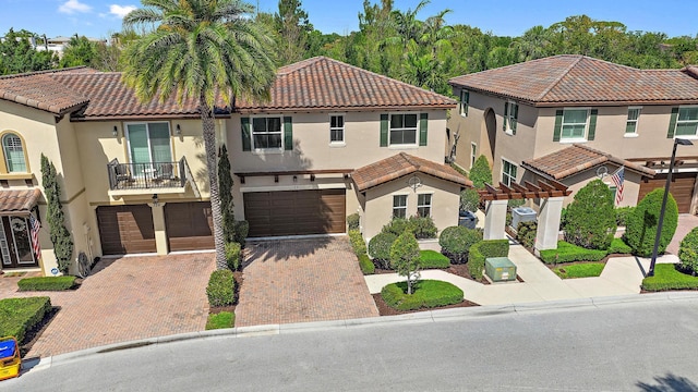 122 Diamante Way, Jupiter, FL 33477 - view of front of home with a garage, driveway, a pergola, and stucco siding
