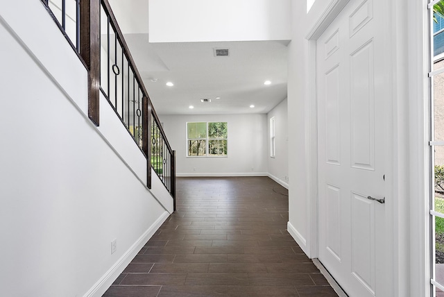 122 Diamante Way, Jupiter, FL 33477 - foyer entrance featuring dark wood-style flooring, baseboards, recessed lighting, and stairway