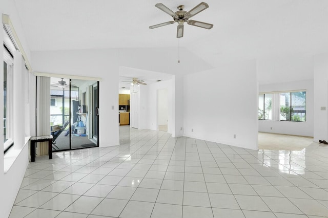 18356 181st Cir S, Boca Raton, FL 33498 - unfurnished living room with light tile patterned flooring, ceiling fan, and vaulted ceiling