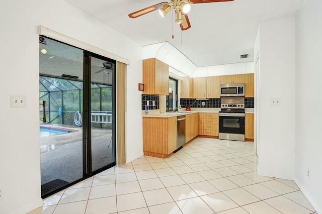 18356 181st Cir S, Boca Raton, FL 33498 - kitchen featuring ceiling fan, visible vents, light countertops, stainless steel appliances, and decorative backsplash