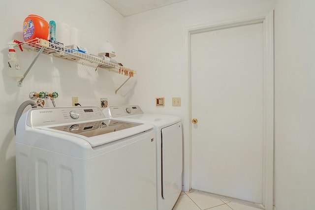 18356 181st Cir S, Boca Raton, FL 33498 - laundry area featuring light tile patterned floors, laundry area, and washing machine and clothes dryer