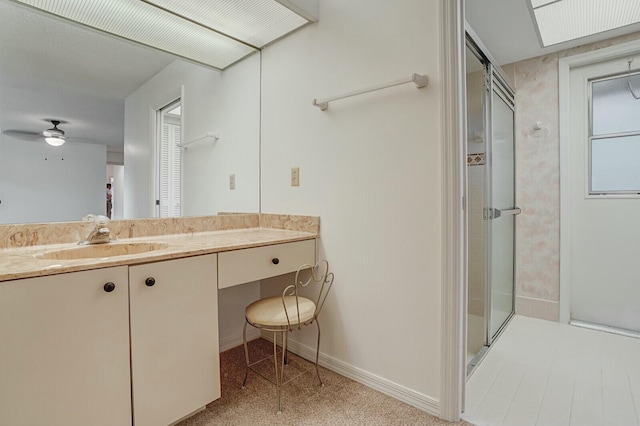 18356 181st Cir S, Boca Raton, FL 33498 - bathroom with a shower stall, vanity, baseboards, and a ceiling fan