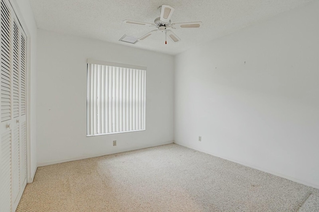 18356 181st Cir S, Boca Raton, FL 33498 - unfurnished bedroom featuring carpet floors, ceiling fan, a closet, and a textured ceiling